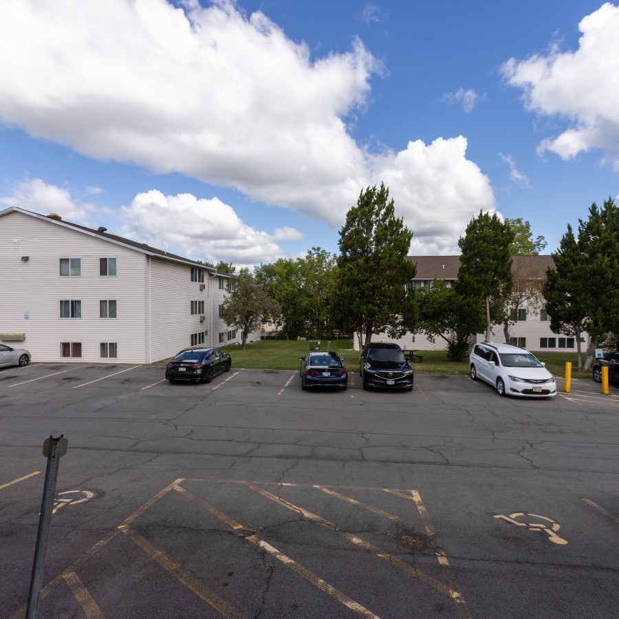 Three-story building across the parking lot at Brook Manor Apartments, Syracuse NY